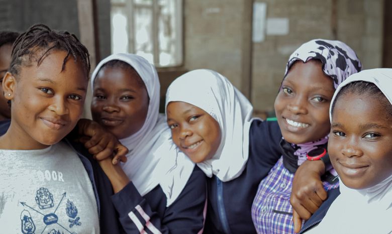 Girls smiling at camera